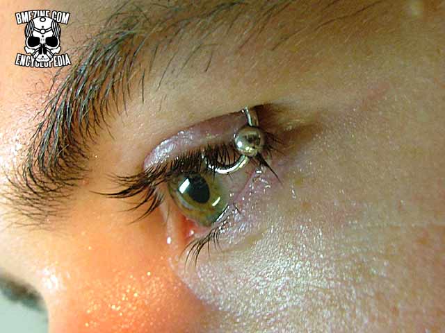 File:Eyelid Piercing-2.jpg
