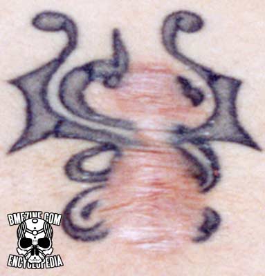 File:Tattoo Incision Damage-4.jpg